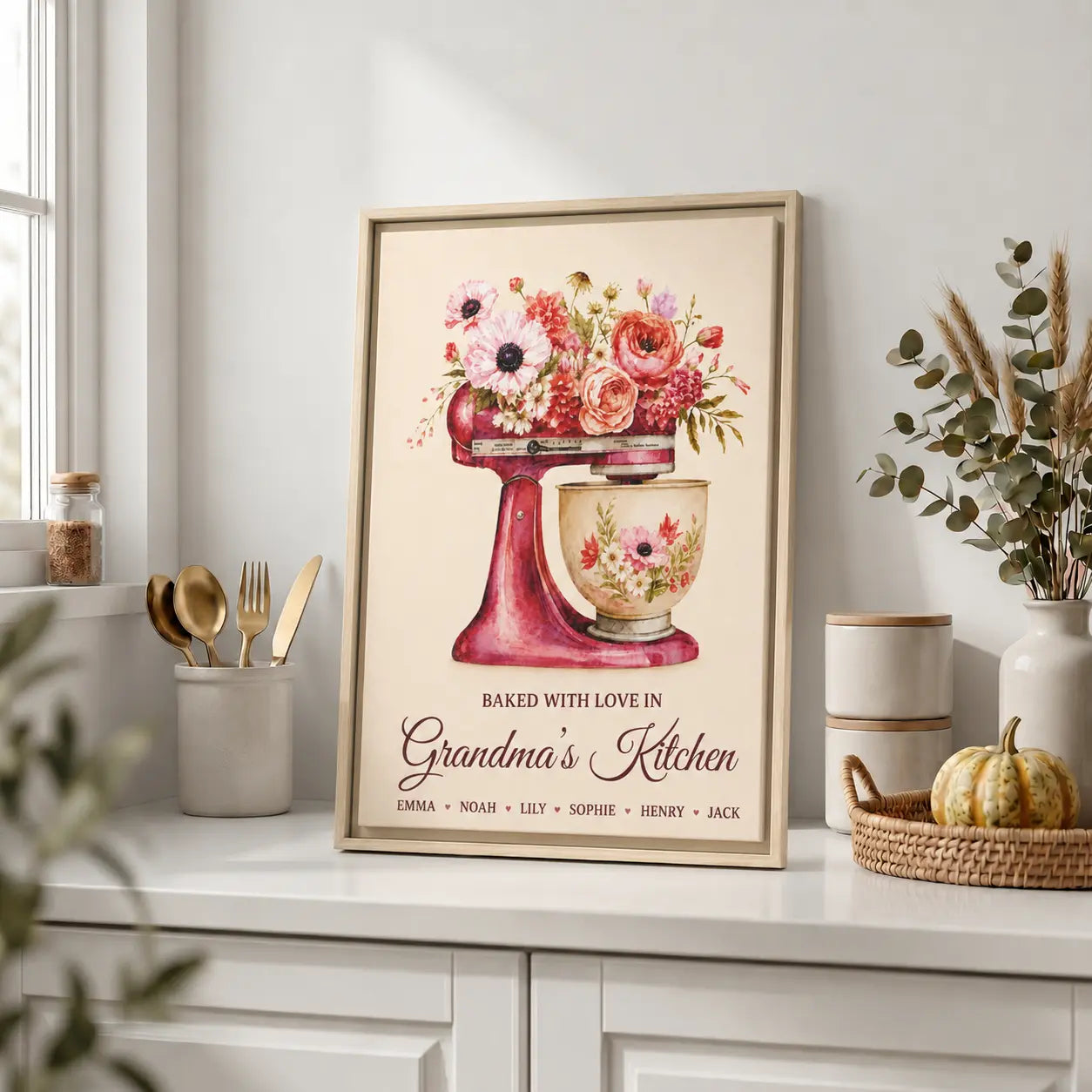 Framed artwork of a kitchen mixer with flowers on a kitchen counter.