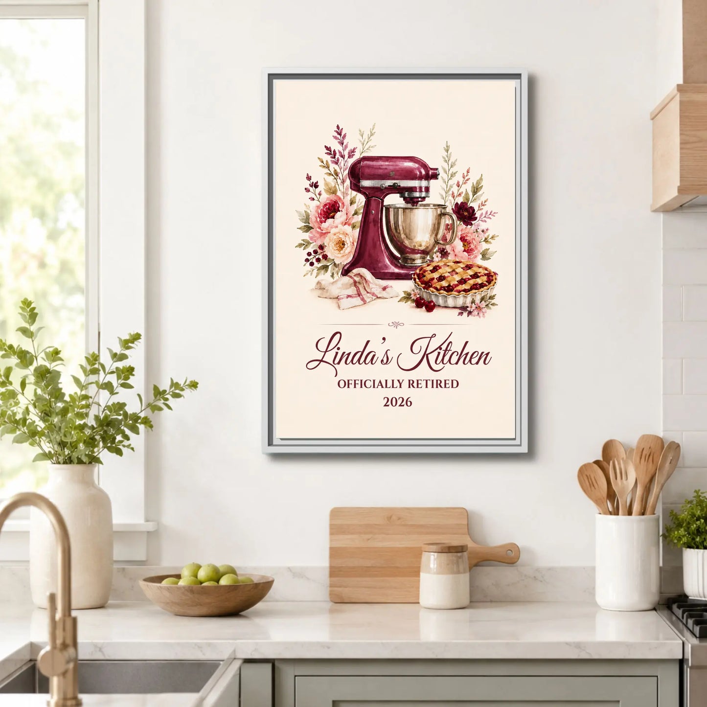 Framed artwork of a kitchen mixer with flowers, a pie and name personalization.